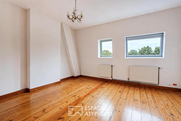 Maison semi-bourgeoise au cachet unique à réinventer