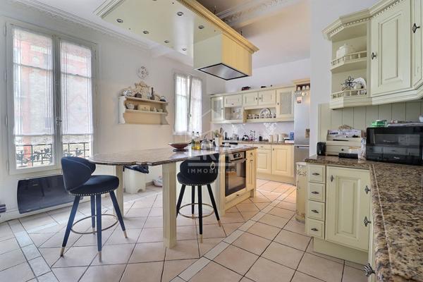 ERA COLOMBES : Splendide Appartement Haussmannien en Plein Centre-Ville
