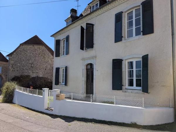 Jolie maison de village avec garage et jardin