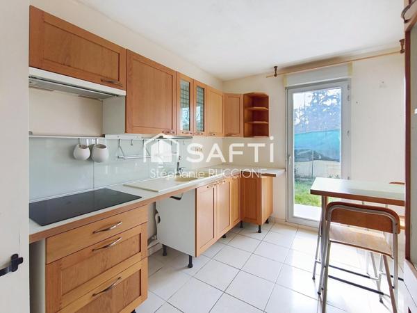Appartement T3, garage, cave, place de parking, jardinet