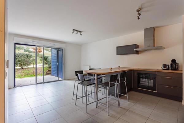 Appartement T4 récent avec terrasse, jardinet et parking en sous-sol