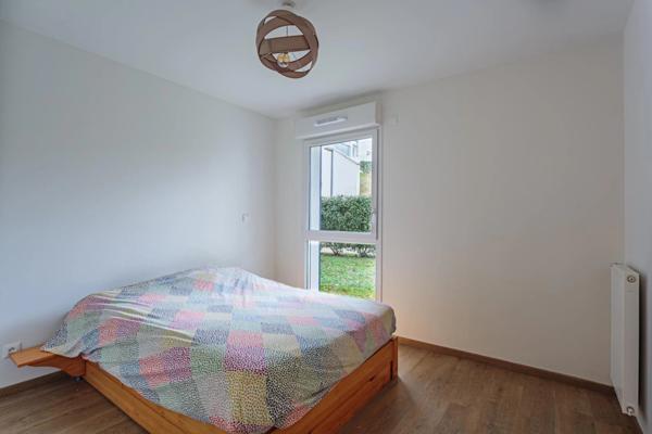 Appartement T4 récent avec terrasse, jardinet et parking en sous-sol