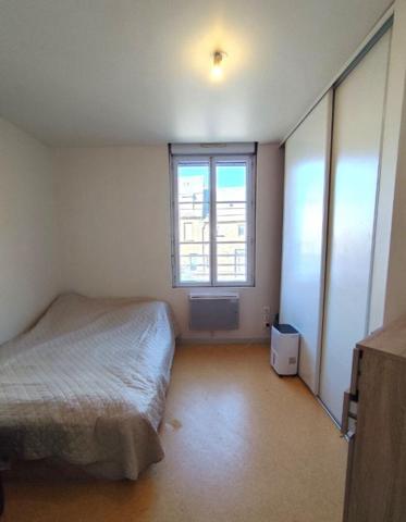 Immeuble avec local commercial et 2 appartements