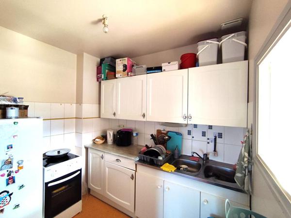 Immeuble avec local commercial et 2 appartements