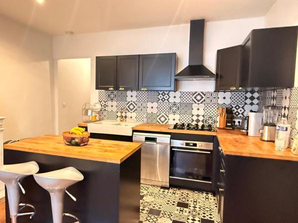 Appartement de standing de 121 m2, 3 ch, cave et jardin