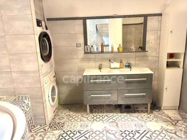 *En exclusivité* Bas de Tourneville*Maison de 72 m², 2 chambres, terrasses et jardin, exposé plein sud