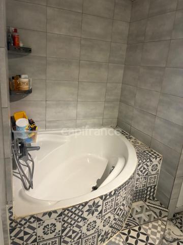 *En exclusivité* Bas de Tourneville*Maison de 72 m², 2 chambres, terrasses et jardin, exposé plein sud