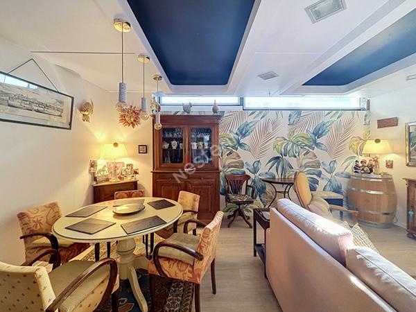 Immeuble à vendre avec un appartement et un local commercial dans le bourg d'INGRANDES-LE-FRESNE-SUR-LOIRE;