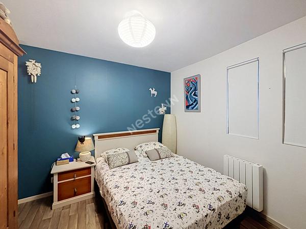 Immeuble à vendre avec un appartement et un local commercial dans le bourg d'INGRANDES-LE-FRESNE-SUR-LOIRE;