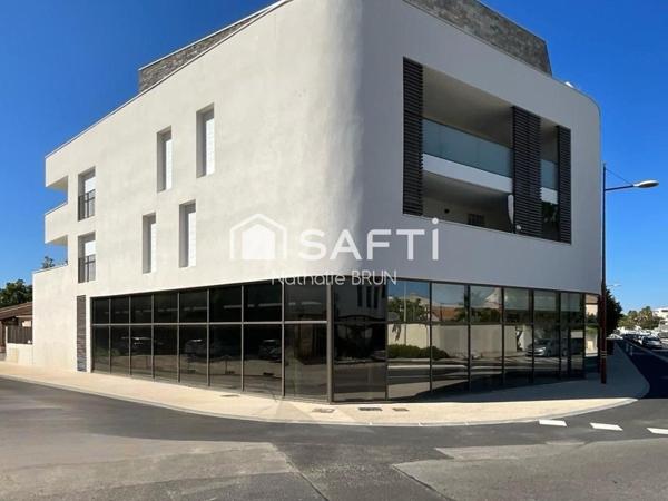 Local commercial de 130m² + stationnements