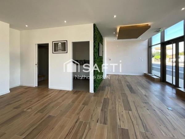 Local commercial de 130m² + stationnements