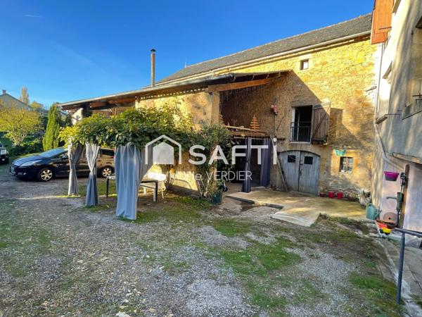 Maison de 235 m2 au coeur de Montbazens avec terrain