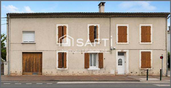 Ensemble immobilier maison + immeuble + terrain