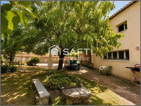 Ensemble immobilier maison + immeuble + terrain