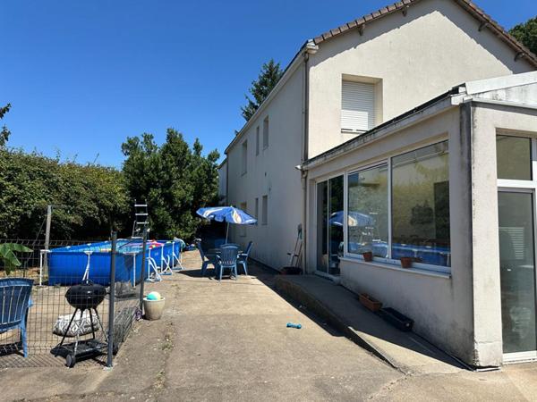Investissement locatif - Maison individuelle avec 2 logements loués