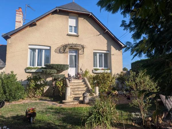 Maison avec jardin, garage et dépendance proche commerces