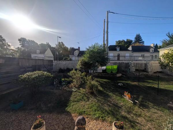 Maison avec jardin, garage et dépendance proche commerces