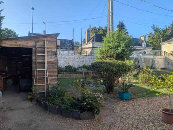 Maison avec jardin, garage et dépendance proche commerces