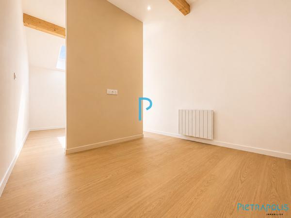 Bel appartement de type T3 avec terrasse et stationnement couvert