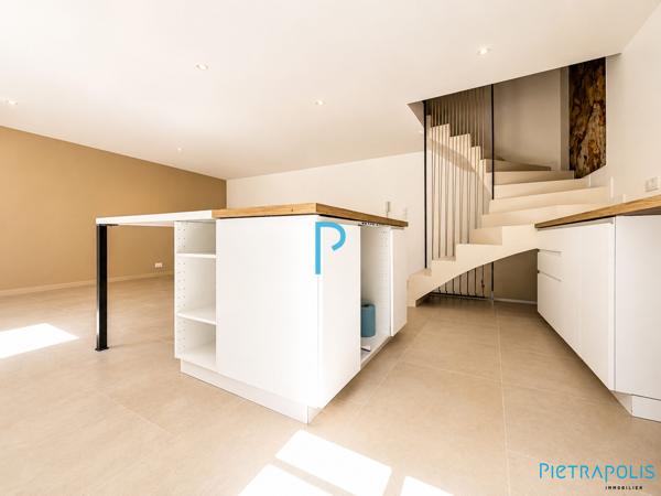 Bel appartement de type T3 avec terrasse et stationnement couvert