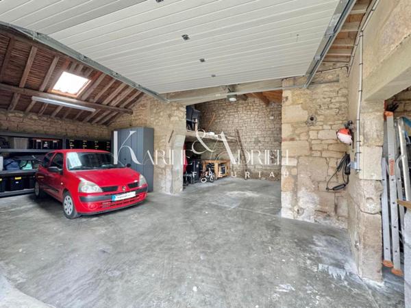 Charmante maison en pierre rénovée avec 3 chambres, bureau, garage, préau et jardin clos