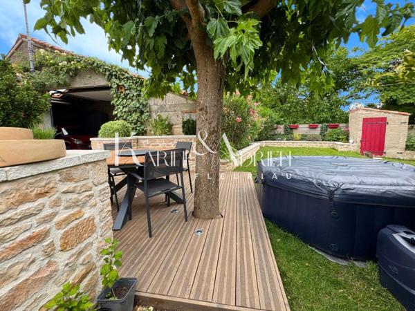 Charmante maison en pierre rénovée avec 3 chambres, bureau, garage, préau et jardin clos