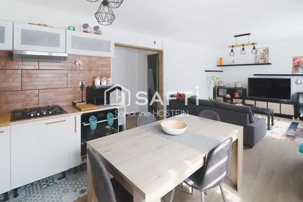Appartement de 60m2 1 chambre avec balcon et cave privée.