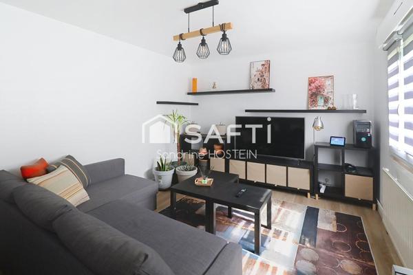 Appartement de 60m2 1 chambre avec balcon et cave privée.