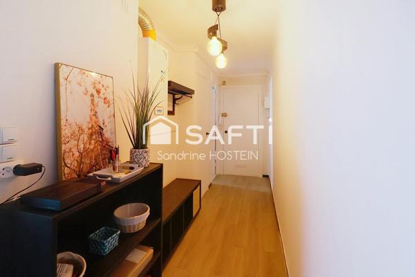 Appartement de 60m2 1 chambre avec balcon et cave privée.