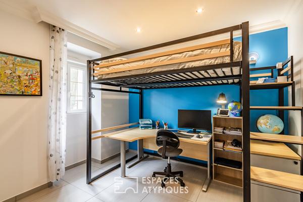 Appartement en rez-de-chaussée avec terrasse, stationnement et garage