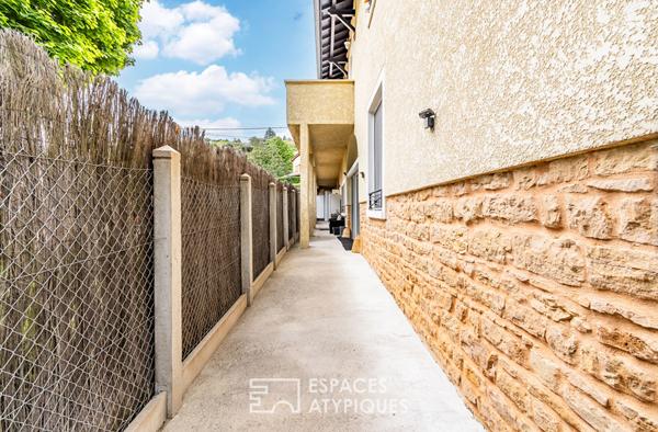 Appartement en rez-de-chaussée avec terrasse, stationnement et garage