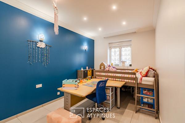 Appartement en rez-de-chaussée avec terrasse, stationnement et garage