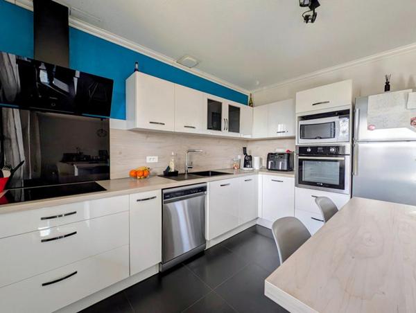 Maison de 130 m2 avec 4 chambres, garage, sur terrain de 579 m²