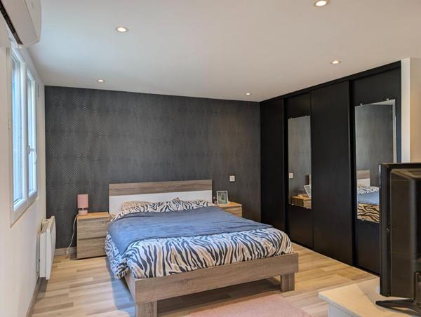 Maison de 130 m2 avec 4 chambres, garage, sur terrain de 579 m²