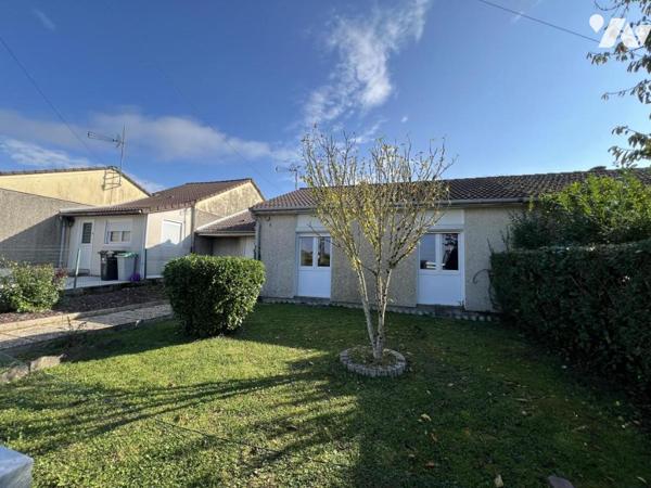 Maison d'habitation  mitoyenne avec un garage 