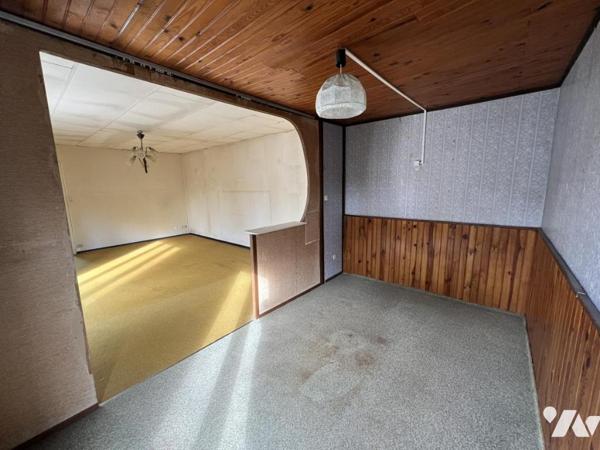 Maison d'habitation  mitoyenne avec un garage 