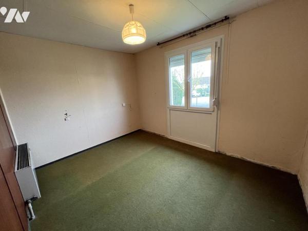 Maison d'habitation  mitoyenne avec un garage 