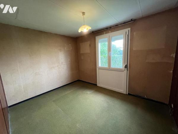 Maison d'habitation  mitoyenne avec un garage 