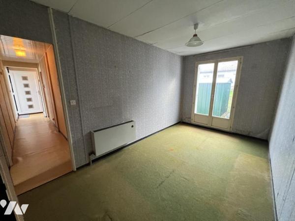 Maison d'habitation  mitoyenne avec un garage 