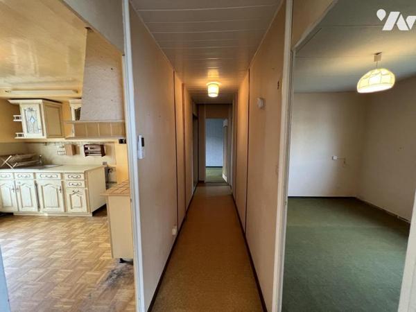 Maison d'habitation  mitoyenne avec un garage 