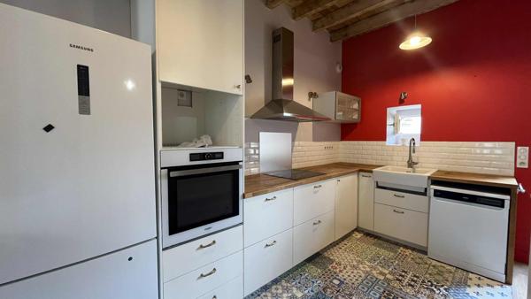 Maison de ville avec jardinet et garage