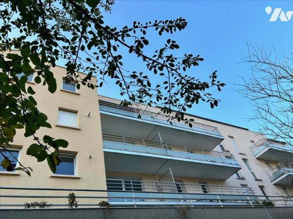 Appartement en parfait état 2ch avec balcon, garage et vue dégagée