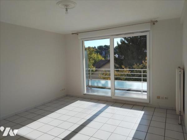 Appartement en parfait état 2ch avec balcon, garage et vue dégagée