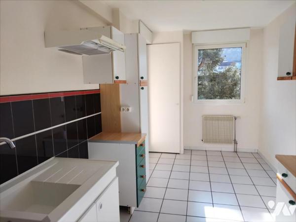 Appartement en parfait état 2ch avec balcon, garage et vue dégagée