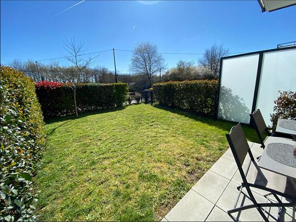 Appartement T.4 en rez-de-jardin à SENE - 80.37 m² avec un grand garage , Sene