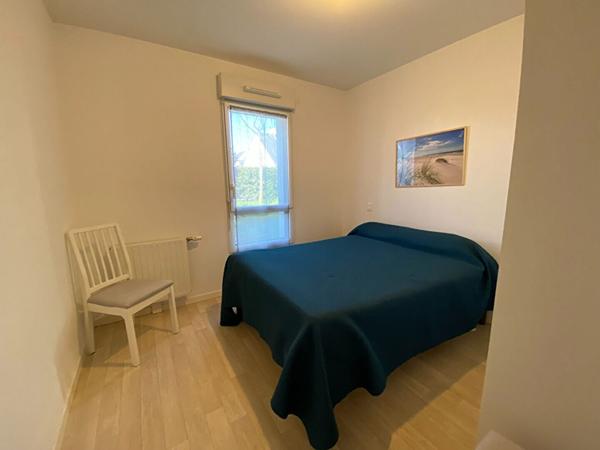 Appartement T.4 en rez-de-jardin à SENE - 80.37 m² avec un grand garage , Sene