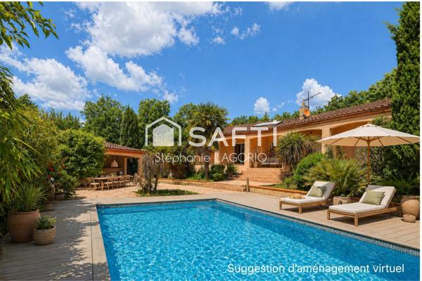 Maison familiale T6 avec piscine et dépendance dans un environnement boisé