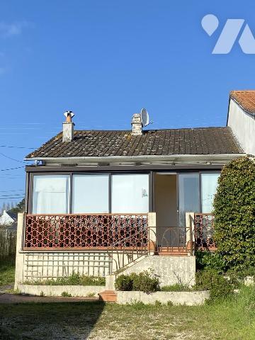 Maison deux chambres de plain pied avec garage. 