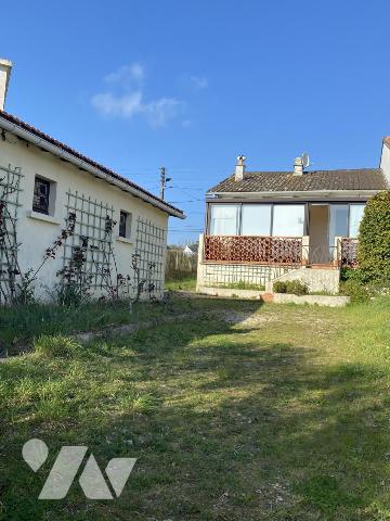 Maison deux chambres de plain pied avec garage. 