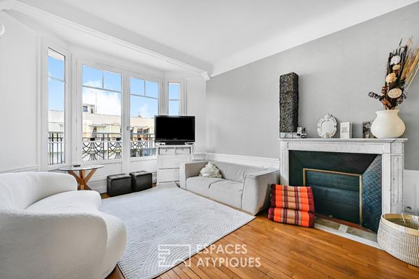 Etage élevé traversant avec balcon-terrasse à Auteuil Sud